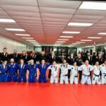 Brazilian Jiu Jisu pracicioners posing for a phodo.