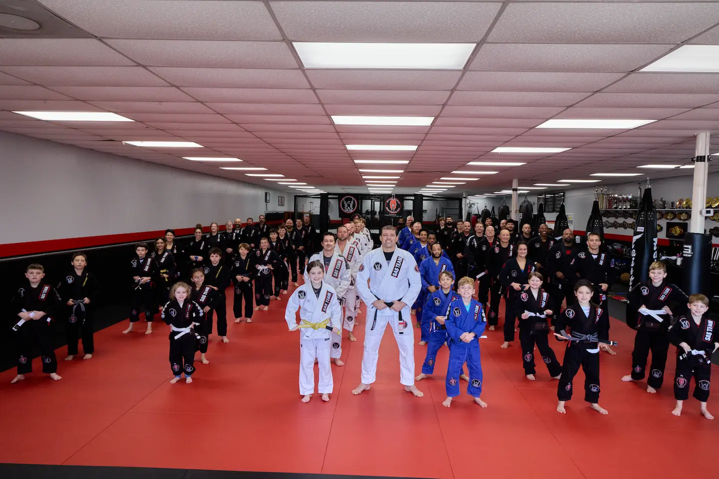 Brazilian Jiu Jisu pracicioners posing for a photo.