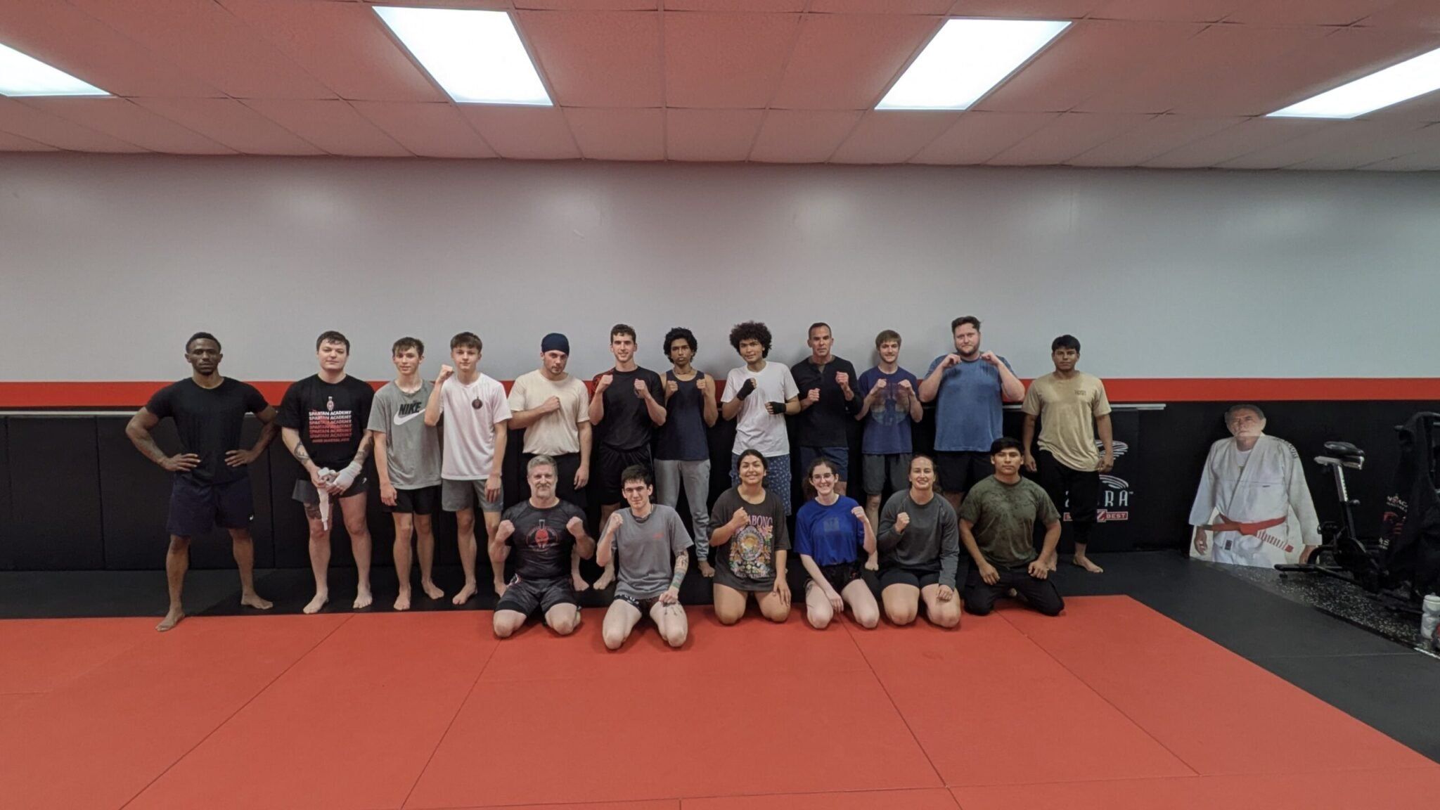 Members of our adult MMA class sharpening striking skills, improving conditioning, and growing stronger together at Spartan Academy.